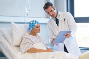 doc assisting patient